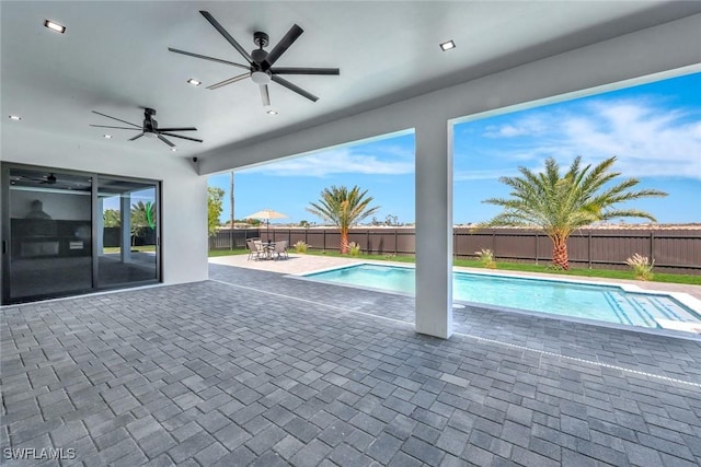 1041 Embers Pkwy W, Cape Coral, FL 33993 - view of pool with a fenced backyard, a fenced in pool, ceiling fan, and a patio area