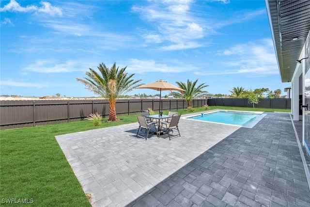 1041 Embers Pkwy W, Cape Coral, FL 33993 - view of swimming pool with a fenced backyard, a fenced in pool, a lawn, and a patio area
