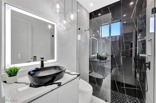 1041 Embers Pkwy W, Cape Coral, FL 33993 - full bath with toilet, vanity, and a marble finish shower