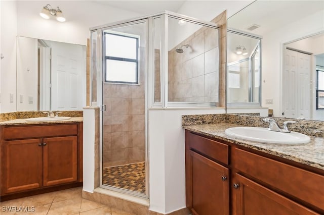 full bathroom featuring a sink and a stall shower