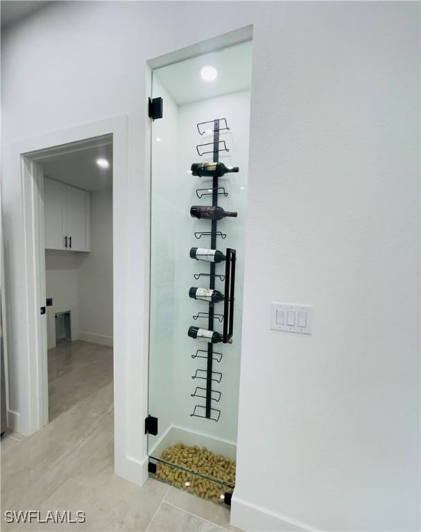 856 Jaguar Blvd, Lehigh Acres, FL 33974 - wine cellar with light tile patterned flooring and baseboards