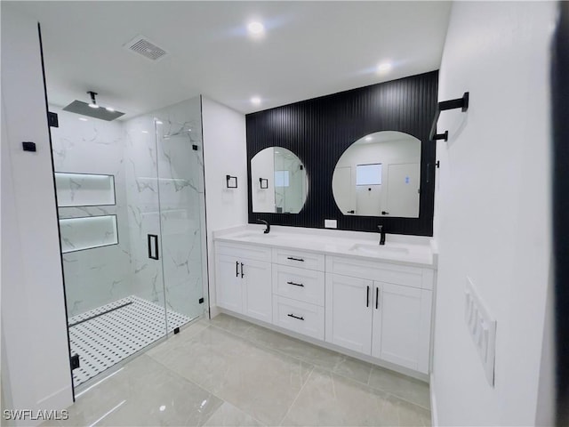 856 Jaguar Blvd, Lehigh Acres, FL 33974 - full bathroom with a marble finish shower, visible vents, a sink, and double vanity