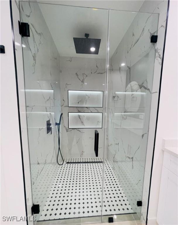 856 Jaguar Blvd, Lehigh Acres, FL 33974 - full bathroom with a marble finish shower