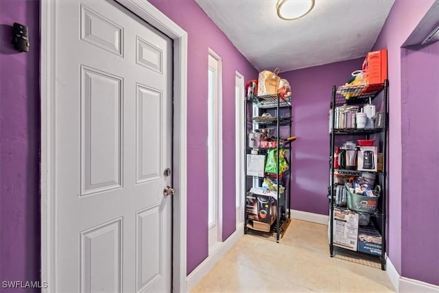 48 Victoria Dr, North Fort Myers, FL 33917 - foyer featuring baseboards