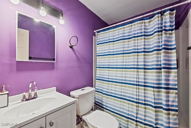 48 Victoria Dr, North Fort Myers, FL 33917 - bathroom featuring toilet, a shower with shower curtain, and vanity
