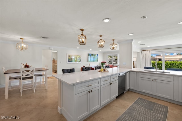 kitchen featuring visible vents, a sink, a wealth of natural light, an inviting chandelier, and stainless steel dishwasher
