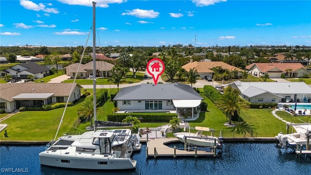 aerial view with a residential view and a water view