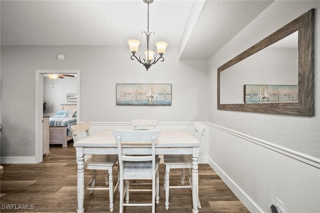 4665 Saint Croix Ln Unit 1525, Naples, FL 34109 - dining room featuring baseboards, wood finished floors, and ceiling fan with notable chandelier