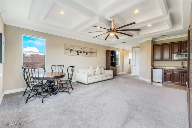 9337 Campanile Cir, Naples, FL 34114 - dining room with ornamental molding, wet bar, a ceiling fan, light carpet, and coffered ceiling