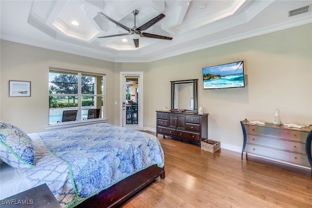 9337 Campanile Cir, Naples, FL 34114 - bedroom featuring visible vents, ornamental molding, baseboards, and wood finished floors