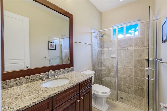 9337 Campanile Cir, Naples, FL 34114 - bathroom featuring vanity, toilet, and a shower stall