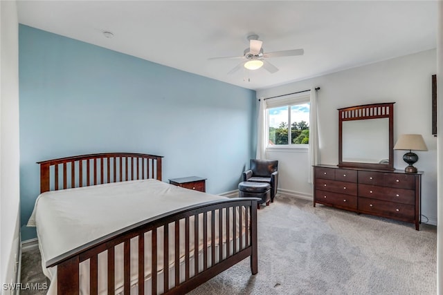 9337 Campanile Cir, Naples, FL 34114 - carpeted bedroom featuring baseboards and ceiling fan