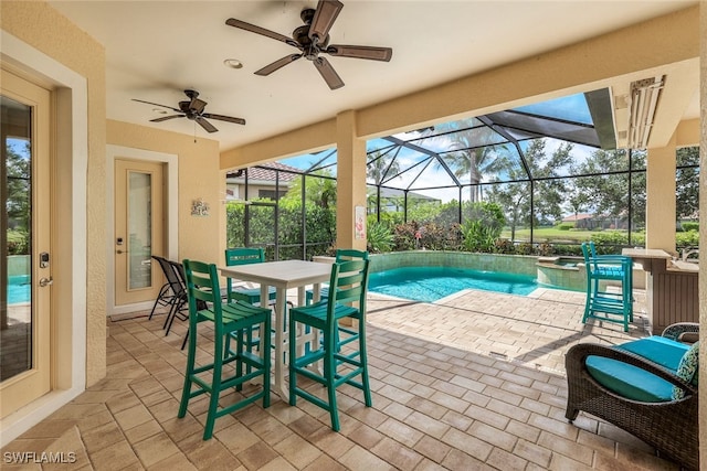 9337 Campanile Cir, Naples, FL 34114 - view of pool featuring a pool with connected hot tub, a lanai, a patio area, and ceiling fan