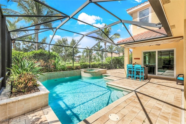 9337 Campanile Cir, Naples, FL 34114 - view of pool featuring glass enclosure, a pool with connected hot tub, ceiling fan, and a patio