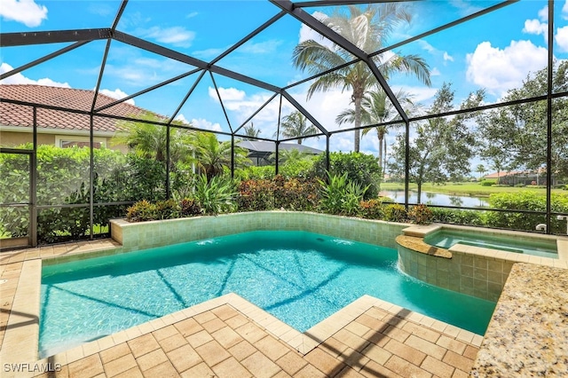 9337 Campanile Cir, Naples, FL 34114 - view of swimming pool with a water view, a pool with connected hot tub, a lanai, and a patio area