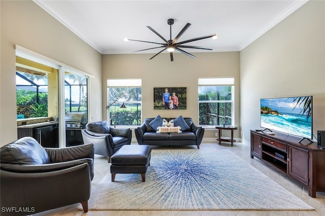 9337 Campanile Cir, Naples, FL 34114 - living room featuring baseboards, ornamental molding, ceiling fan, and light tile patterned floors