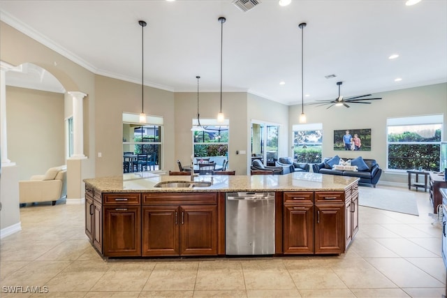 9337 Campanile Cir, Naples, FL 34114 - kitchen with open floor plan, decorative columns, a sink, dishwasher, and a ceiling fan