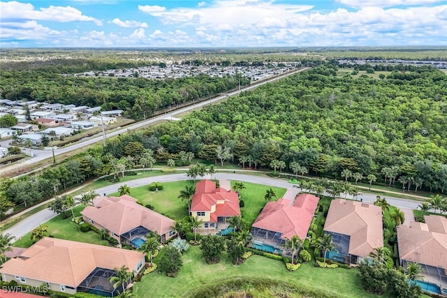9337 Campanile Cir, Naples, FL 34114 - drone / aerial view with a forest view and a residential view