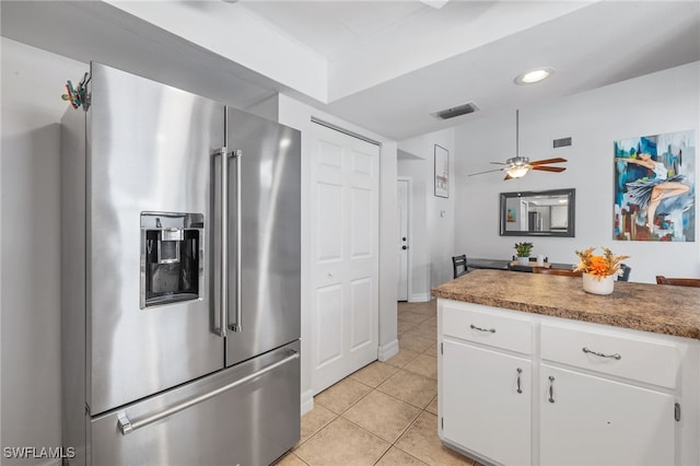 1015 SE 25th Ln, Cape Coral, FL 33904 - kitchen featuring visible vents, white cabinets, high end refrigerator, and light tile patterned floors
