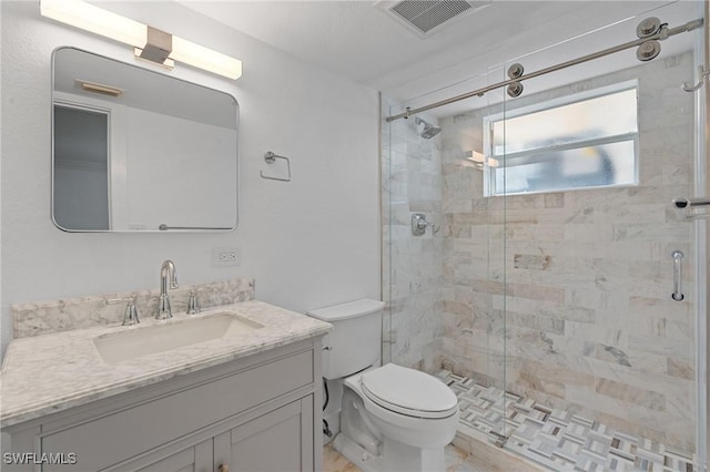 980 7th Ave S Unit 107, Naples, FL 34102 - bathroom with a shower stall and vanity