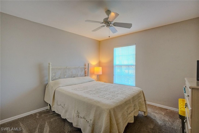 bedroom featuring ceiling fan, carpet floors, and baseboards
