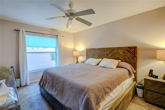 bedroom with light colored carpet and ceiling fan