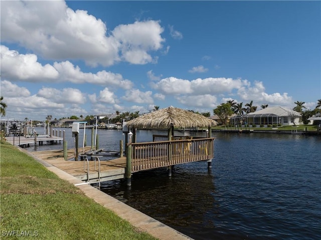 view of dock featuring a water view and boat lift