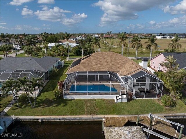 bird's eye view with a water view and a residential view