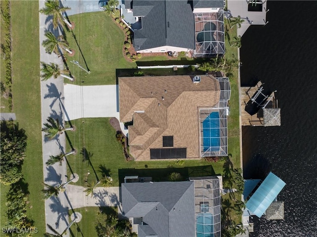 bird's eye view with a water view