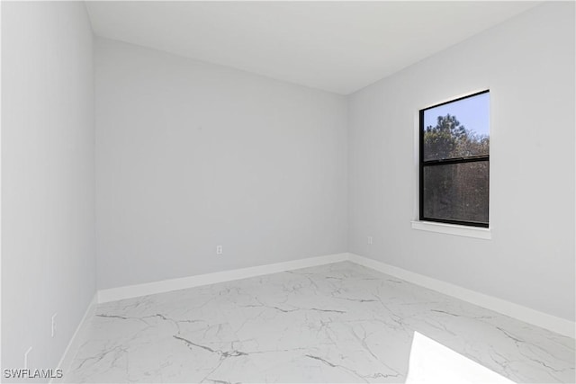 157 Everglades Blvd S, Naples, FL 34117 - empty room with marble finish floors and baseboards