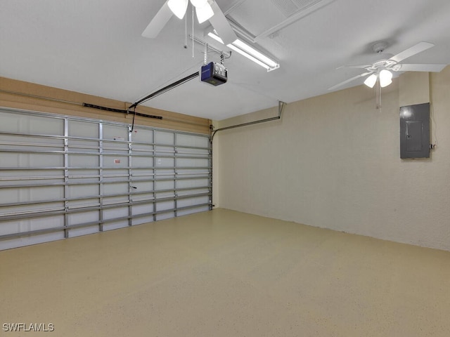 3904 SW 20th Ave, Cape Coral, FL 33914 - garage with a garage door opener, electric panel, and a ceiling fan