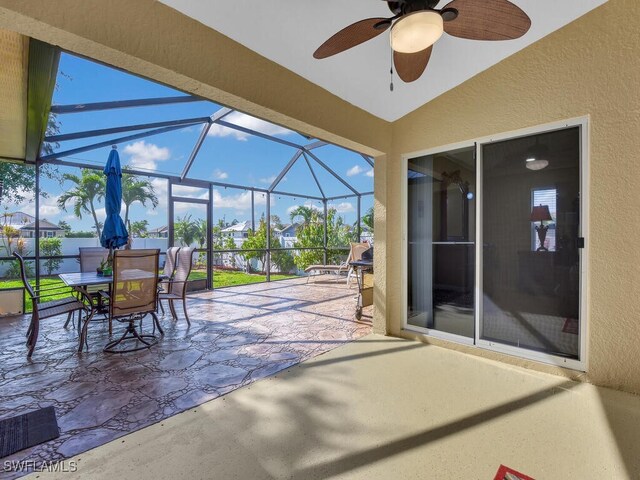 3904 SW 20th Ave, Cape Coral, FL 33914 - view of patio / terrace with outdoor dining area, a lanai, and a ceiling fan