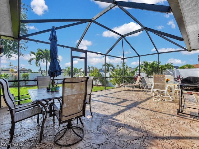 3904 SW 20th Ave, Cape Coral, FL 33914 - view of patio / terrace with outdoor dining space and a lanai
