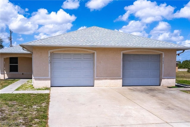 garage with driveway