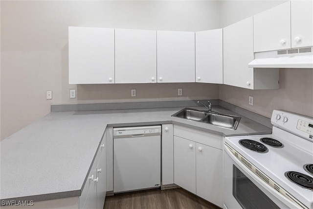 kitchen with white cabinetry, white appliances, dark wood-style flooring, under cabinet range hood, and a sink
