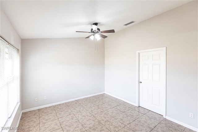 unfurnished room featuring a ceiling fan, baseboards, and visible vents