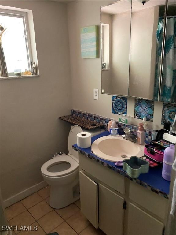 5450-5452 8th Ave, Fort Myers, FL 33907 - full bathroom featuring tile patterned flooring and vanity