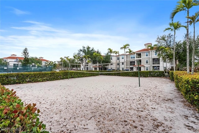 view of home's community featuring volleyball court
