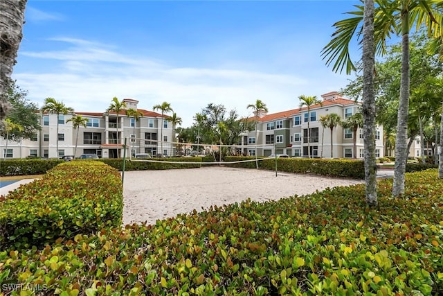 view of home's community with a residential view and volleyball court