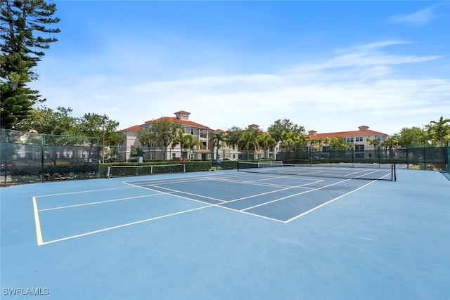 view of sport court with fence and community basketball court