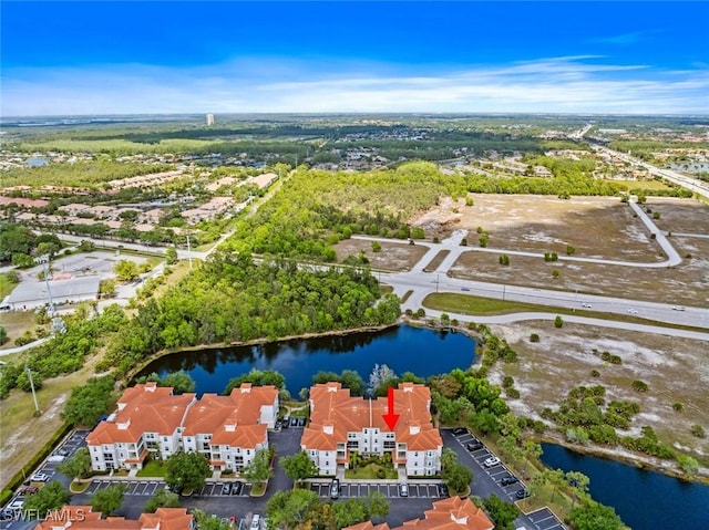 23560 Walden Center Dr Unit 306, Estero, FL 34134 - aerial view of property and surrounding area with a nearby body of water