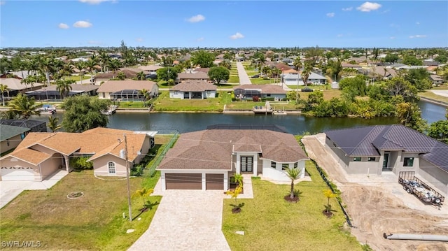 309 SW 15th Ter, Cape Coral, FL 33991 - aerial view with a water view and a residential view