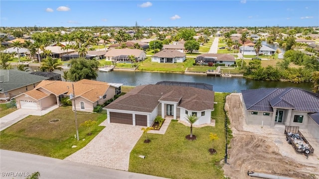 309 SW 15th Ter, Cape Coral, FL 33991 - drone / aerial view with a residential view and a water view