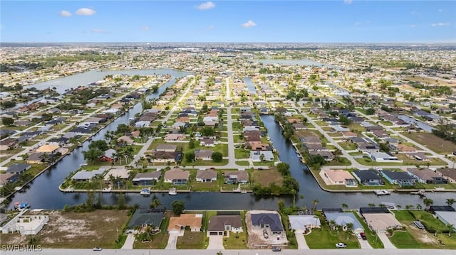 309 SW 15th Ter, Cape Coral, FL 33991 - bird's eye view featuring a residential view and a water view