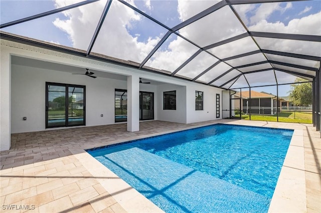 309 SW 15th Ter, Cape Coral, FL 33991 - outdoor pool featuring a lanai, ceiling fan, and a patio area