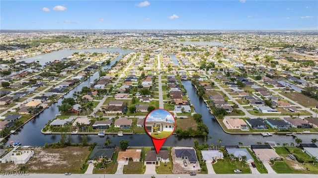 309 SW 15th Ter, Cape Coral, FL 33991 - bird's eye view featuring a water view and a residential view