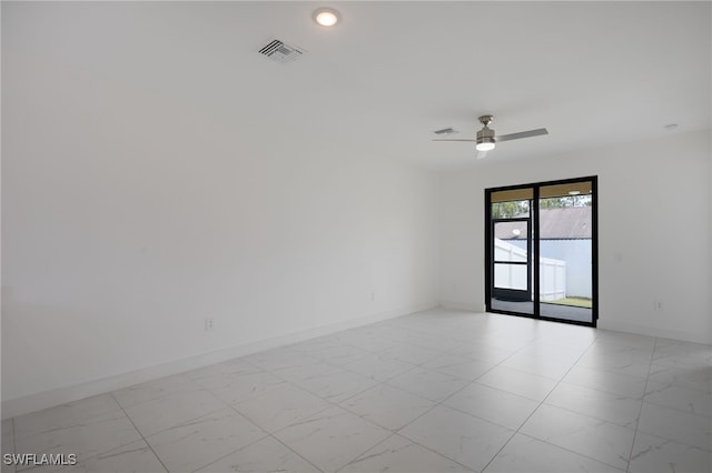 909-911 Homestead Rd S, Lehigh Acres, FL 33974 - spare room with ceiling fan, visible vents, recessed lighting, marble finish floor, and baseboards