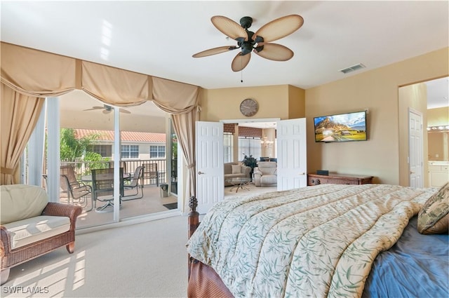 4834 Hampshire Ct Unit 207, Naples, FL 34112 - carpeted bedroom featuring visible vents, ceiling fan, access to outside, and ensuite bathroom