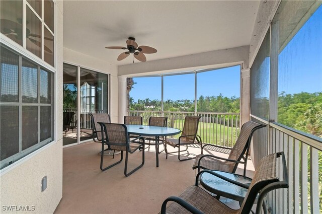 4834 Hampshire Ct Unit 207, Naples, FL 34112 - sunroom with a ceiling fan
