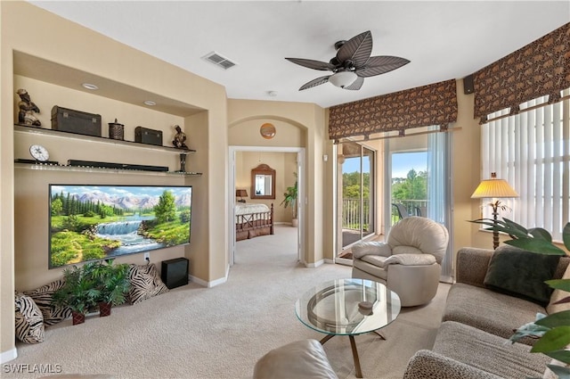 4834 Hampshire Ct Unit 207, Naples, FL 34112 - carpeted living room with ceiling fan, baseboards, and visible vents
